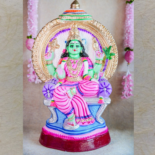 Handcrafted Navarathri Golu Doll of Goddess Rajeshwari seated on a throne with an ornamental umbrella, featuring vibrant colors and intricate details.