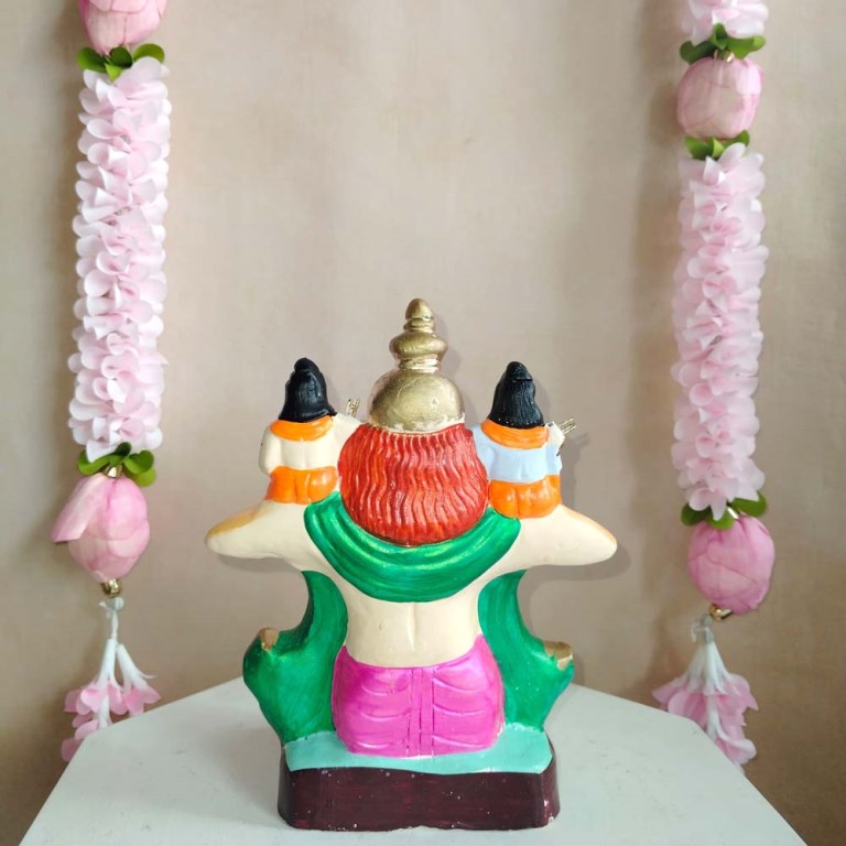 Handcrafted Navarathri Golu doll showing Hanuman carrying Lord Ram and Lakshman on his shoulders in vibrant colors.