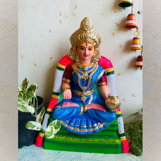 Handcrafted Goddess Annapoorani Navaratri Golu Doll with vibrant colors and intricate details, holding a pot of grains, ideal for festive decor.
