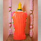 Handcrafted Durga Vishnu idol in vibrant pink and blue, adorned with intricate detailing, standing gracefully on a pedestal.