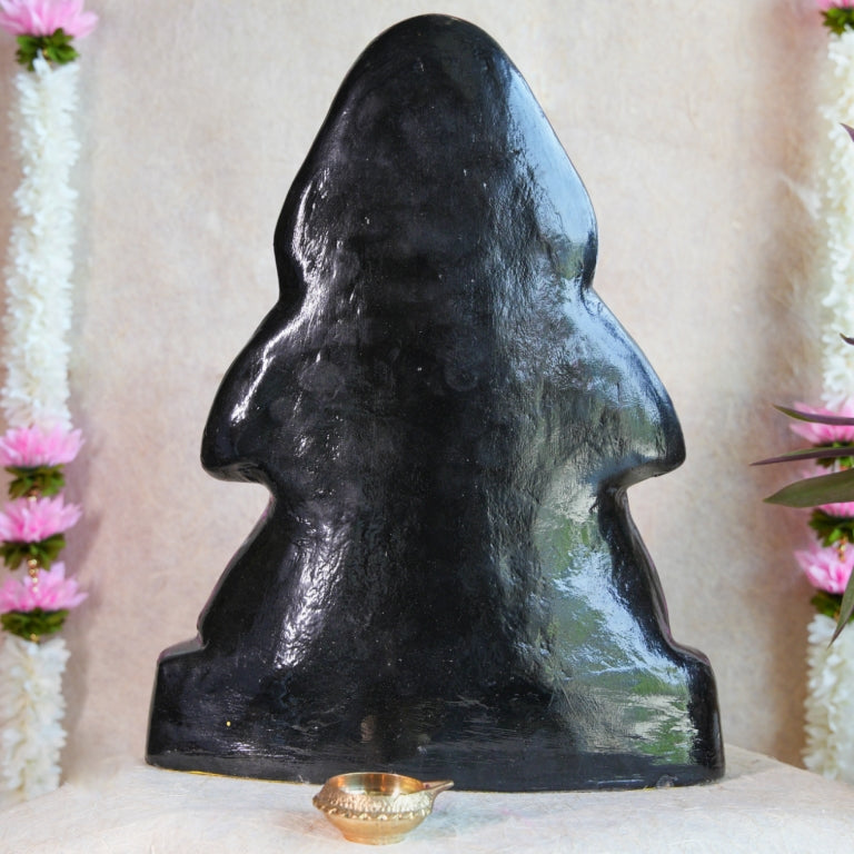 Handcrafted Black Ganesh Navaratri Golu Doll with vibrant garlands and intricate detailing, perfect for festive and spiritual decor.