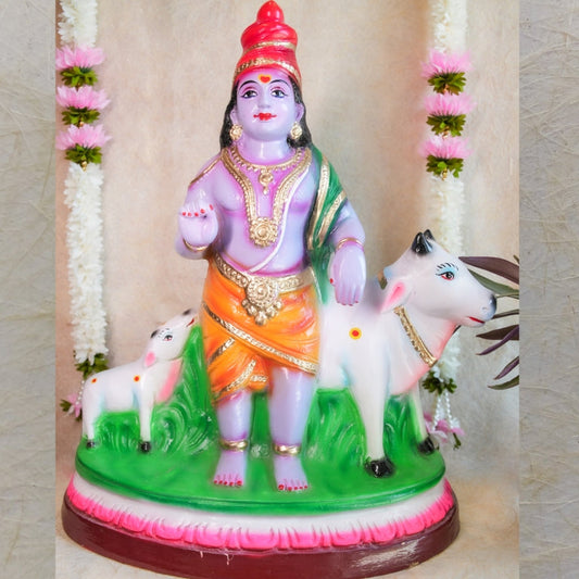 Handcrafted Krishna Mannarkudi Rajagopalan Navaratri Golu Doll with vibrant colors and intricate detailing, featuring cows and divine symbolism.