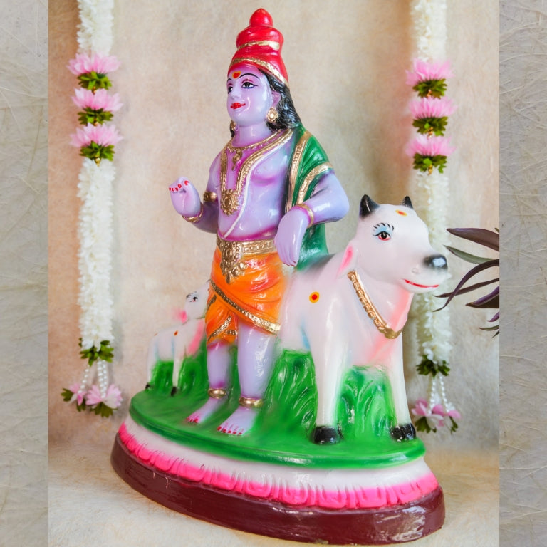 Handcrafted Krishna Mannarkudi Rajagopalan Navaratri Golu Doll with vibrant colors and intricate detailing, featuring cows and divine symbolism.