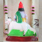 Handcrafted Krishna Mannarkudi Rajagopalan Navaratri Golu Doll with vibrant colors and intricate detailing, featuring cows and divine symbolism.
