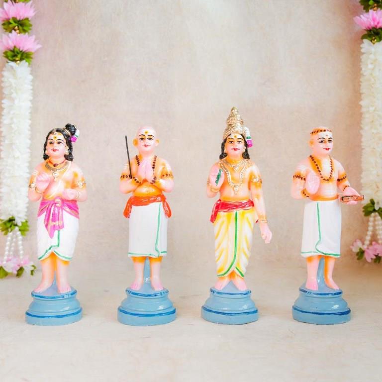 Handcrafted Nalvar Saints idol set for Navaratri Golu, featuring vibrant detailing and traditional attire.