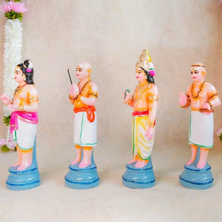 Handcrafted Nalvar Saints idol set for Navaratri Golu, featuring vibrant detailing and traditional attire.