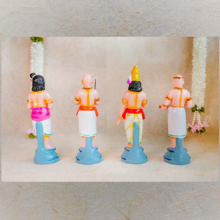 Handcrafted Nalvar Saints idol set for Navaratri Golu, featuring vibrant detailing and traditional attire.
