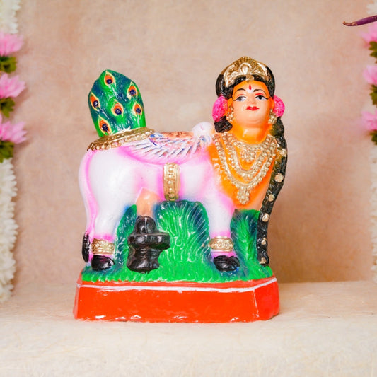 Handcrafted Kamadhenu idol with vibrant colors, peacock tail, and intricate detailing for Navaratri Golu.