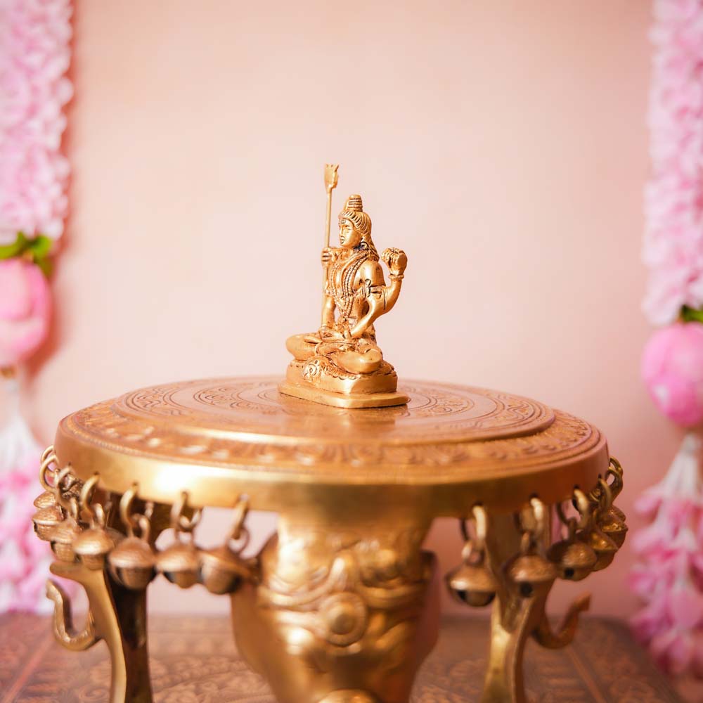 Handcrafted Small Brass Shiva Idol featuring intricate detailing of Lord Shiva seated with a trident and damru.