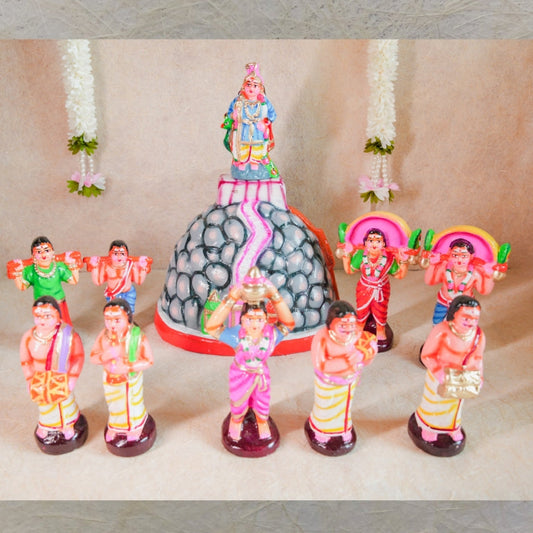 Handcrafted Navarathri Golu dolls - Murugan Pazhani Malai set depicting Lord Murugan on Palani Hills with pilgrims.