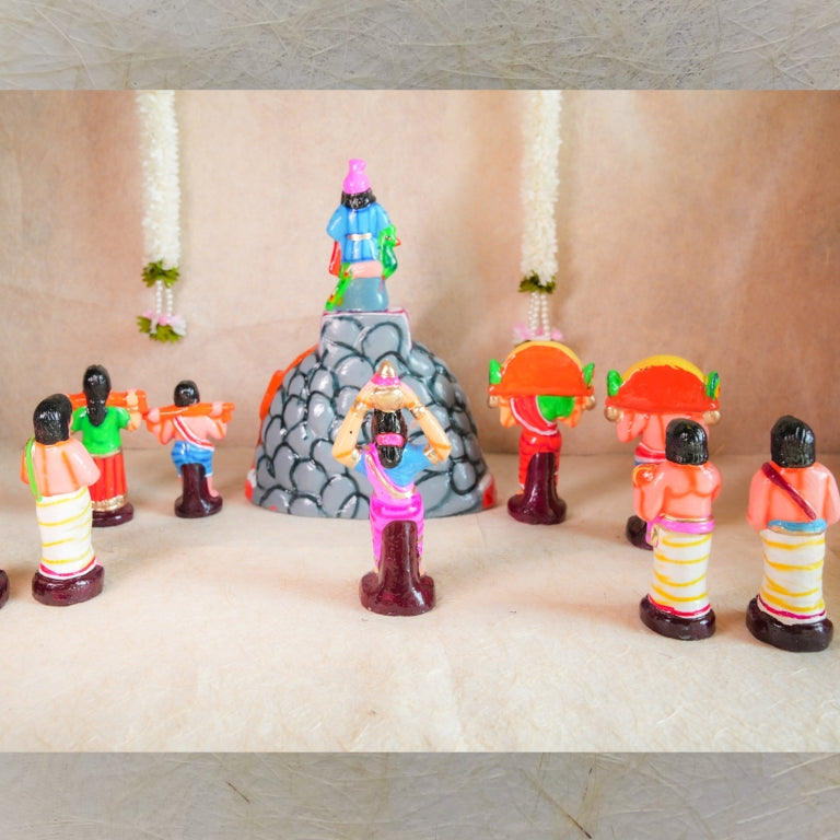 Handcrafted Navarathri Golu dolls - Murugan Pazhani Malai set depicting Lord Murugan on Palani Hills with pilgrims.