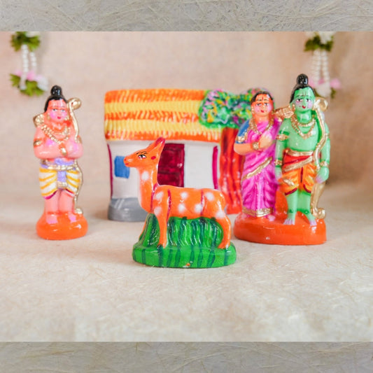 Handcrafted Navarathri Golu doll set featuring Lord Rama, Sita, Lakshmana, and the golden deer, with a hut and forest backdrop.