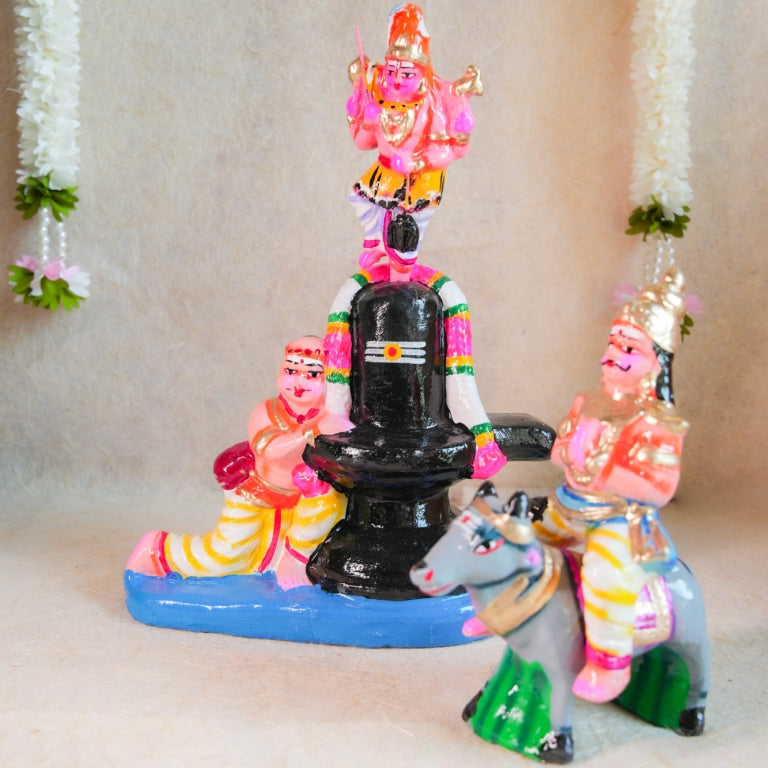 Handcrafted Navarathri Golu doll set featuring Lord Shiva, Markandeya, Yama on a buffalo, and the Shivalinga.