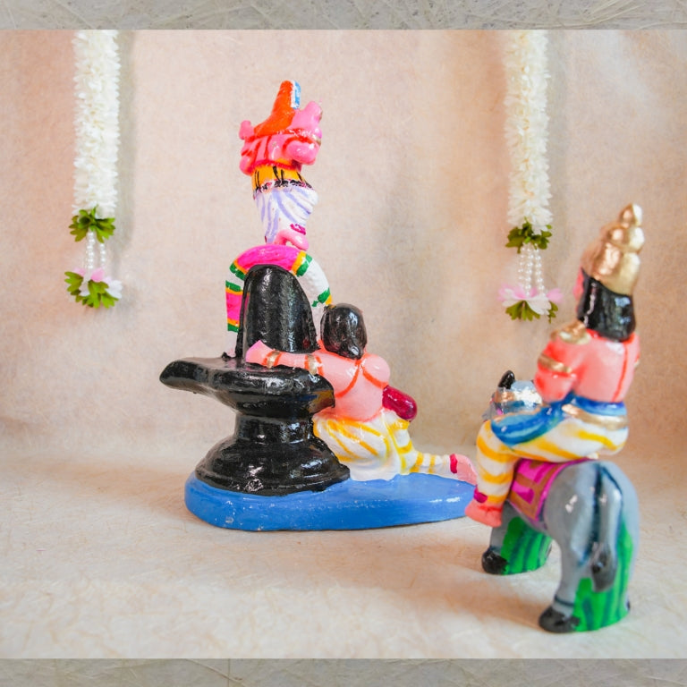 Handcrafted Navarathri Golu doll set featuring Lord Shiva, Markandeya, Yama on a buffalo, and the Shivalinga.