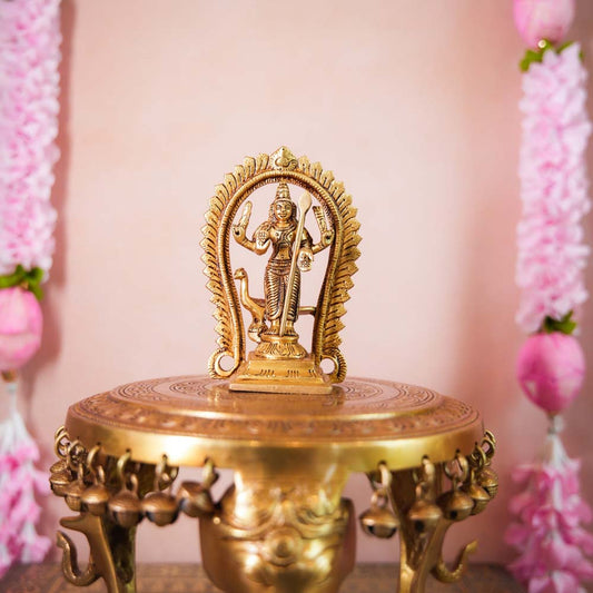 Handcrafted Brass Murugan Idol with an ornate arch, intricately detailed, ideal for home temples and festive decor.