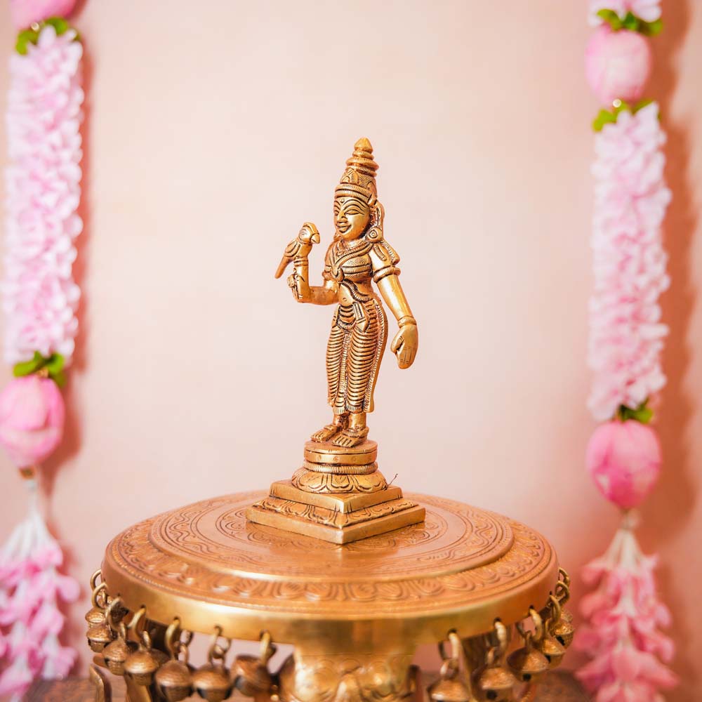 Handcrafted Small Brass Meenakshi Idol holding a parrot, intricately detailed, perfect for home temples or Navaratri decor.
