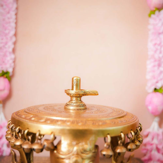 Handcrafted Brass Shivalingam idol with intricate detailing, perfect for home temples or spiritual rituals.
