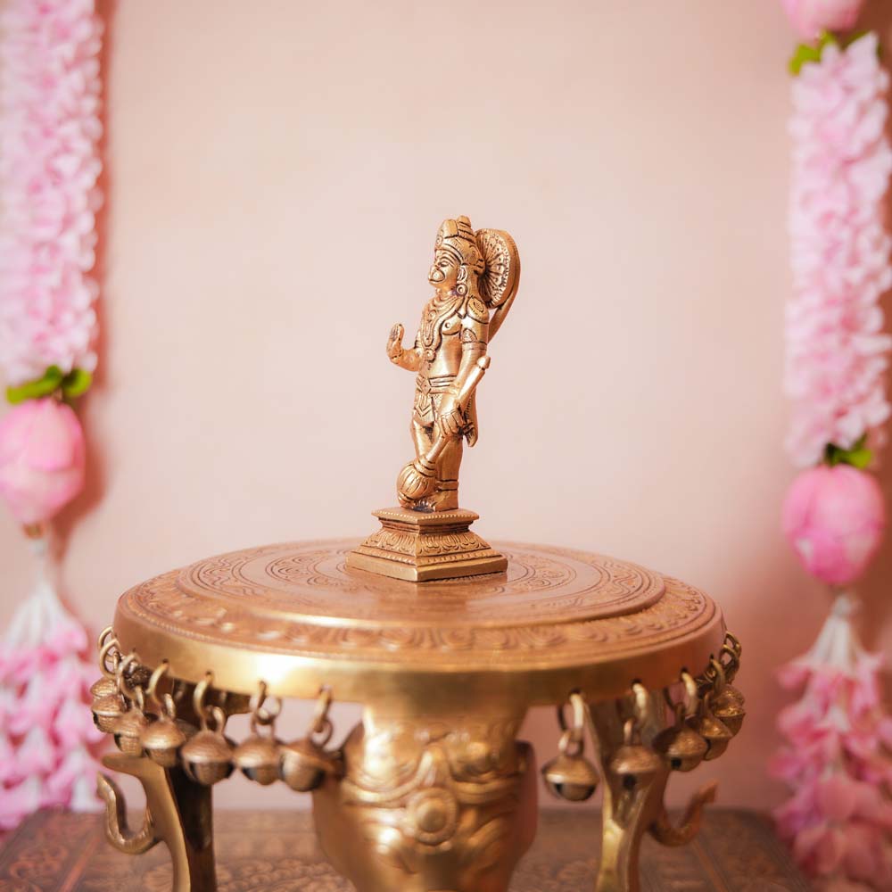 Handcrafted Brass Hanuman Idol holding a mace, intricately detailed, ideal for home temples and spiritual decor.