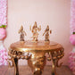 Handcrafted Brass Murugan Set featuring Lord Murugan with Valli and Devasena, intricately detailed and perfect for home temples and Navaratri displays.