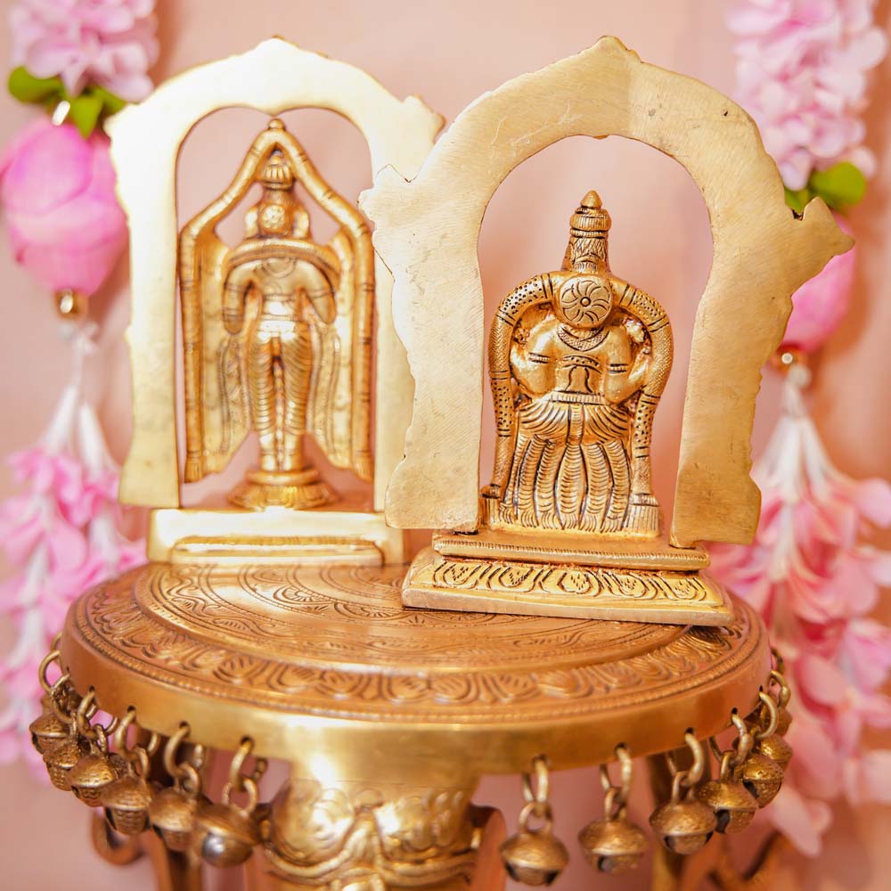Handcrafted Brass Perumal Set featuring idols of Lord Vishnu and Goddess Lakshmi with intricate arch designs, perfect for home temples and festive decor.