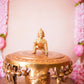 Big Brass Ladoo Krishna idol, intricately handcrafted, depicting Bal Krishna holding a ladoo, perfect for home temples and festive decor.