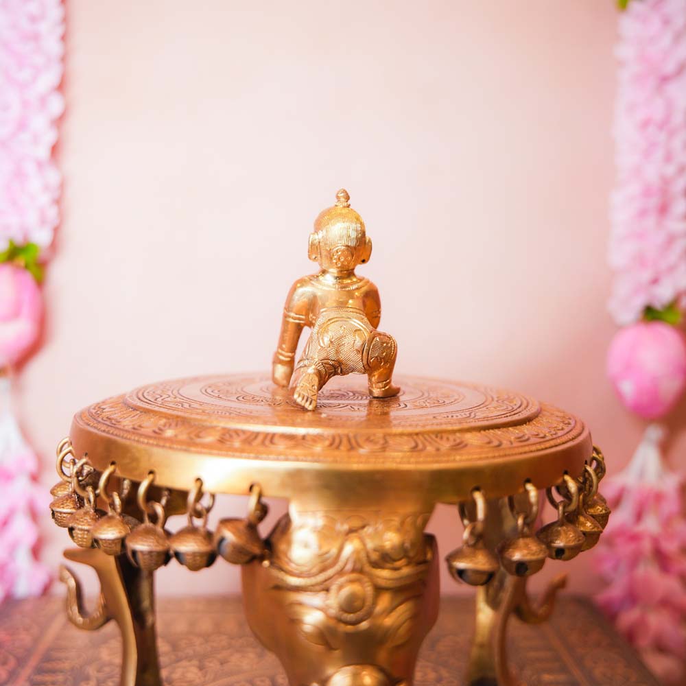 Big Brass Ladoo Krishna idol, intricately handcrafted, depicting Bal Krishna holding a ladoo, perfect for home temples and festive decor.
