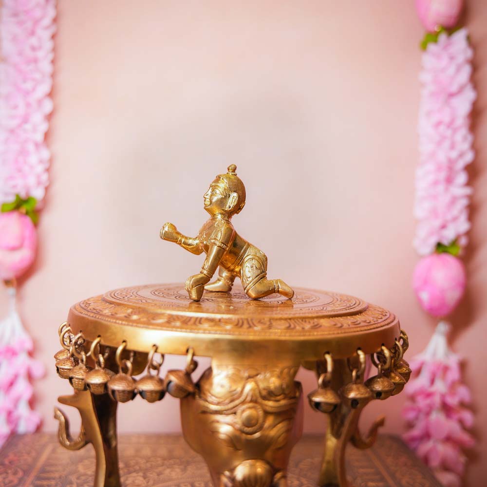 Small Brass Ladoo Krishna idol, intricately handcrafted, depicting Bal Krishna holding a ladoo, perfect for home temples and festive decor.