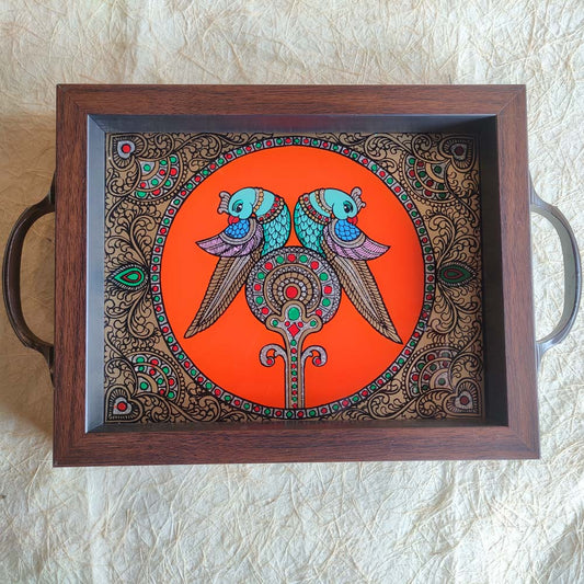 Decorative serving tray with twin parrot artwork on a vibrant orange background, framed with dark wood and metallic handles.