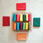 Assorted solid color silk cotton blouse pieces in vibrant shades, ideal for saree pairing and custom tailoring