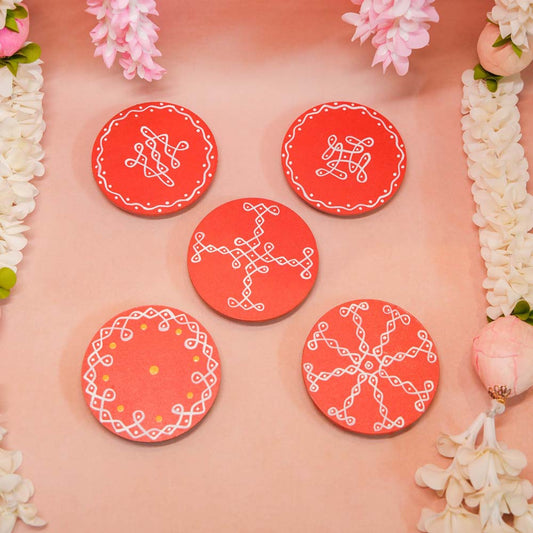 Set of 2 handcrafted Round Kolam Manai in orange with white kolam designs, ideal for pooja decor and festive occasions.