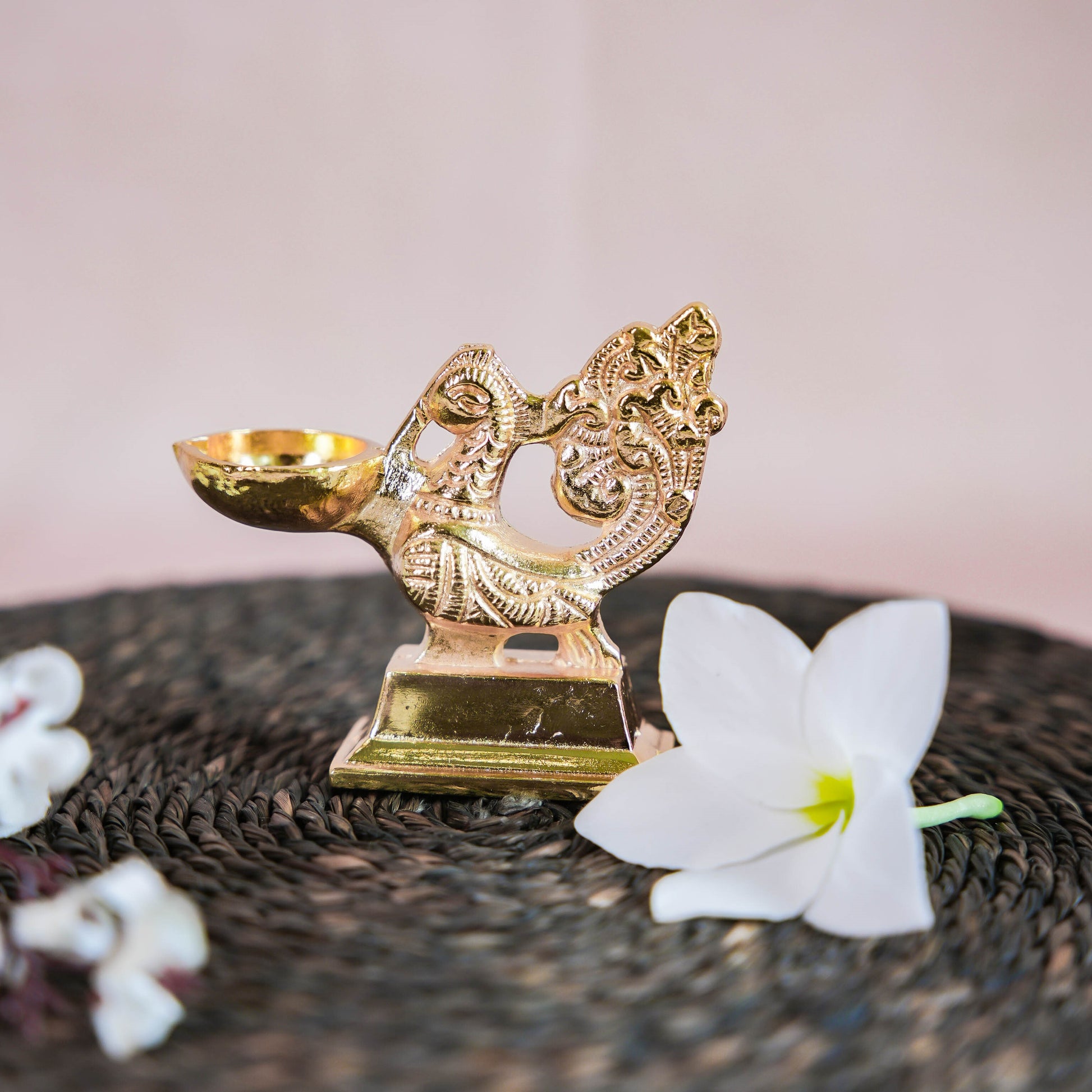 Gold Finish Peacock Lamp with Intricate Design and Ornate Detailing.