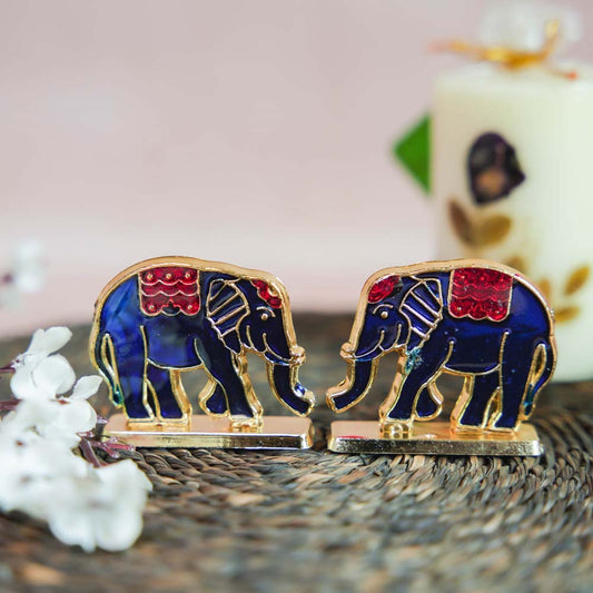 Miniature Elephant Decor Set with Golden Finish and Blue and Red Enamel Detailing.