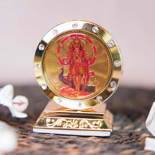 Murugan Car Dashboard Stand with Golden Frame, Embedded Crystals, and Vibrant Depiction of Lord Murugan.