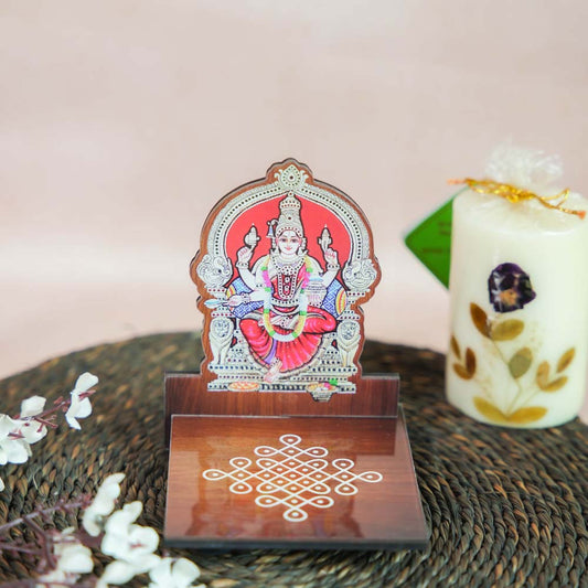 Handcrafted Amman Diya Wall Stand featuring a divine depiction of Amman with a kolam design base, perfect for puja decor.