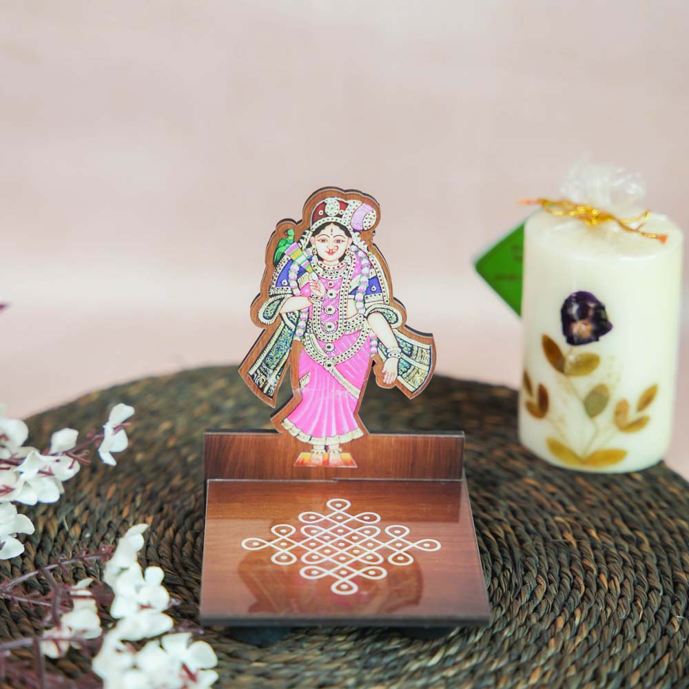 Andal Diya Wall Stand with a colorful depiction of Goddess Andal and a kolam-patterned wooden base for holding oil lamps.