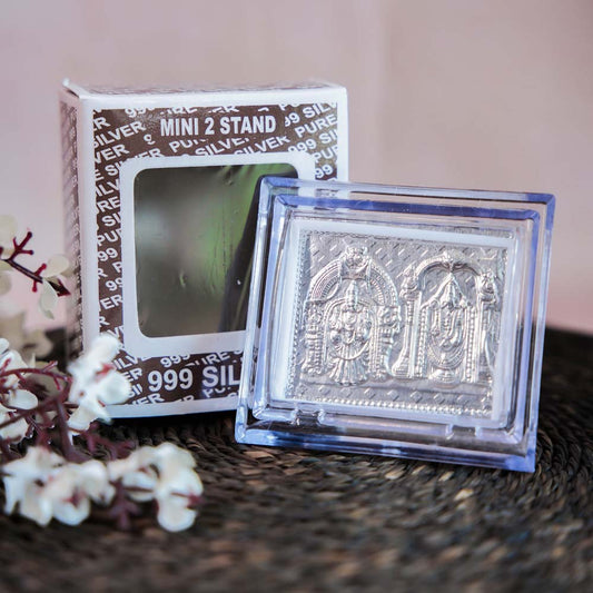 Silver Balaji Padmavati Frame in a Transparent Stand with Intricate Silver Detailing of the Divine Couple.