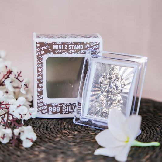 Silver Ganesh Frame in a Transparent Stand with Detailed Carving of Lord Ganesha.