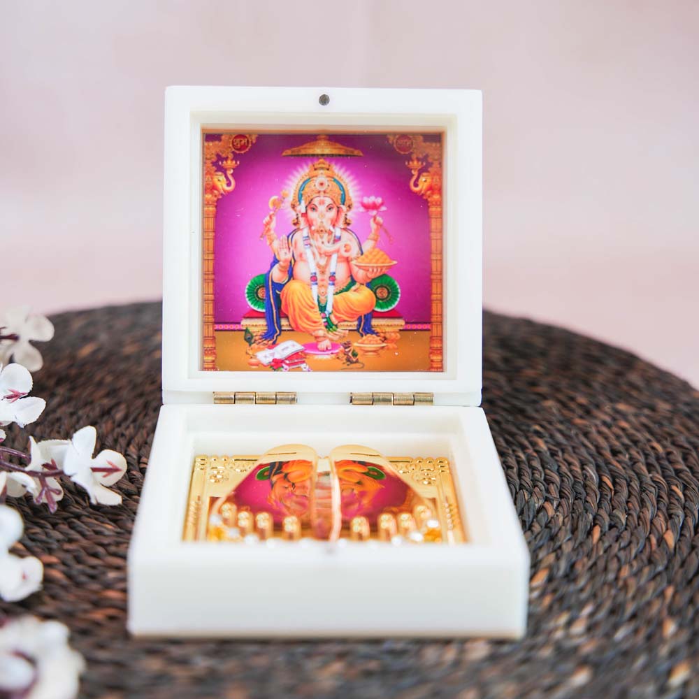 Ganesh Paduka in a Decorative Box with Golden Base and Artwork of Lord Ganesha.