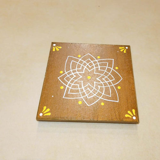 Brown Kolam Manai platform with a red kolam design, used for traditional pooja and rituals.