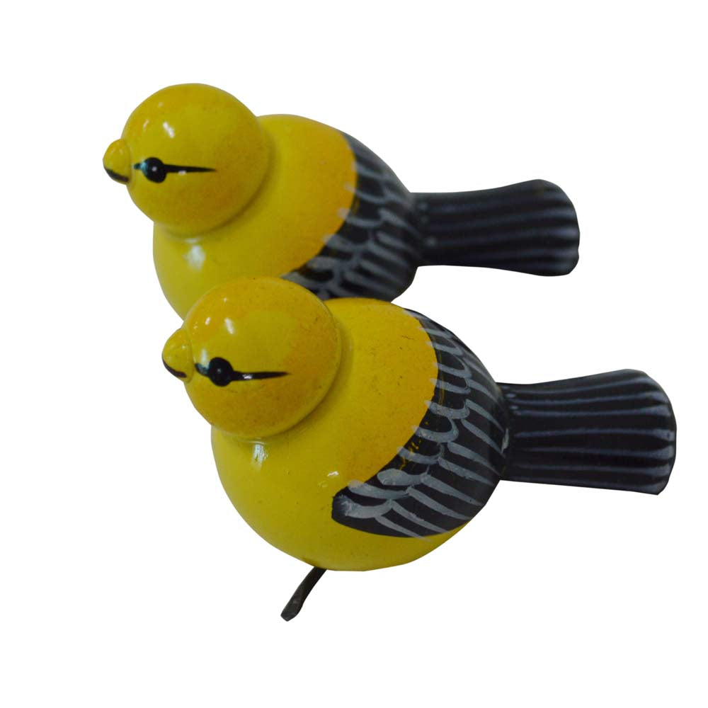 Handcrafted Navaratri Golu bird figurines in yellow and black with intricate painted details.