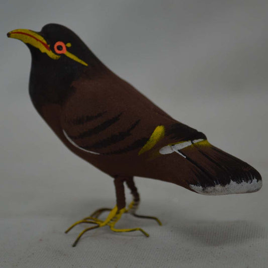 Handcrafted Navaratri Golu brown dove figurine with intricate detailing and hand-painted accents.
