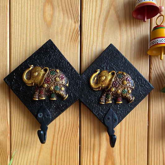 Royal Elephant Wall Key Hook Set in black with golden embellished elephant designs and colorful accents, ideal for home decor.