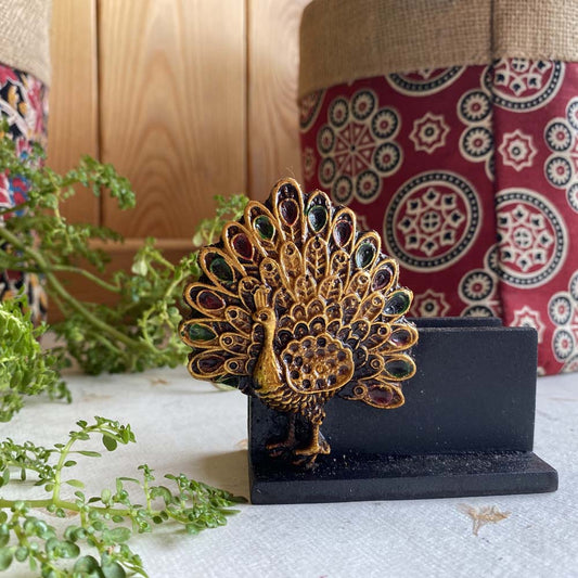 Black visiting card holder with an intricately designed, colorful peacock motif, perfect for office or home desks.
