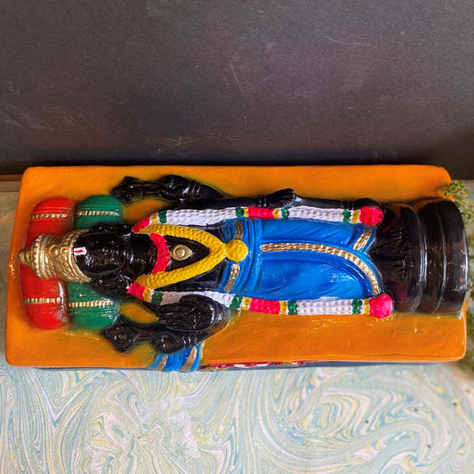 Handcrafted Navarathri Golu doll of Lord Athi Varadhar in a reclining pose, adorned with traditional detailing.