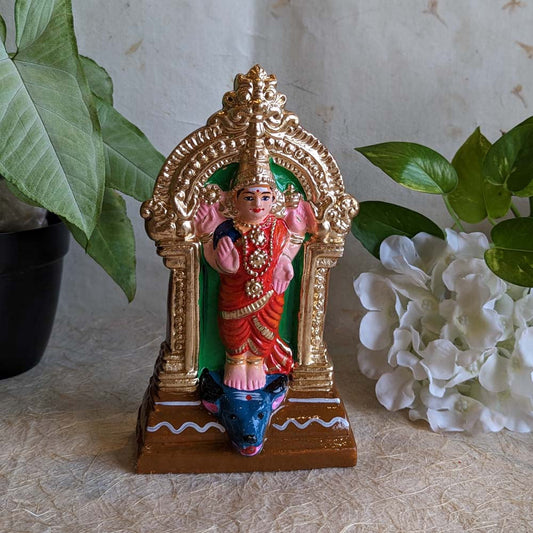 Handcrafted Goddess Durgai Amman Golu doll seated within a golden Thiruvatchi arch, dressed in red attire with intricate detailing, perfect for Navaratri decor.