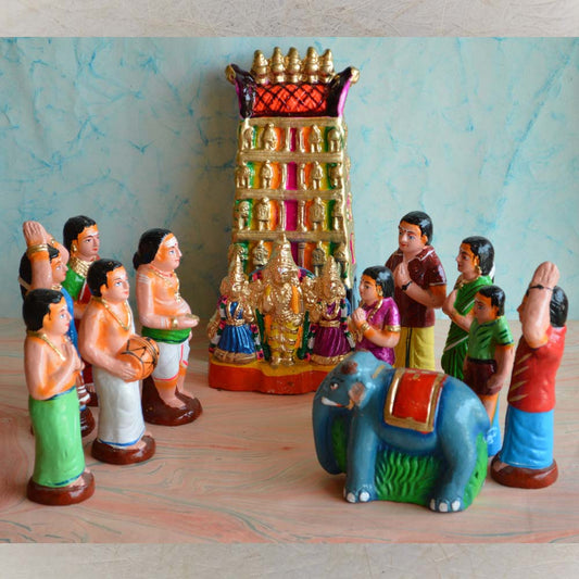 Handcrafted Navaratri Sorgavasal Golu doll set featuring Lord Vishnu, Goddess Lakshmi, a grand Vaikunta entrance, devotees, and musicians in vibrant colors.
