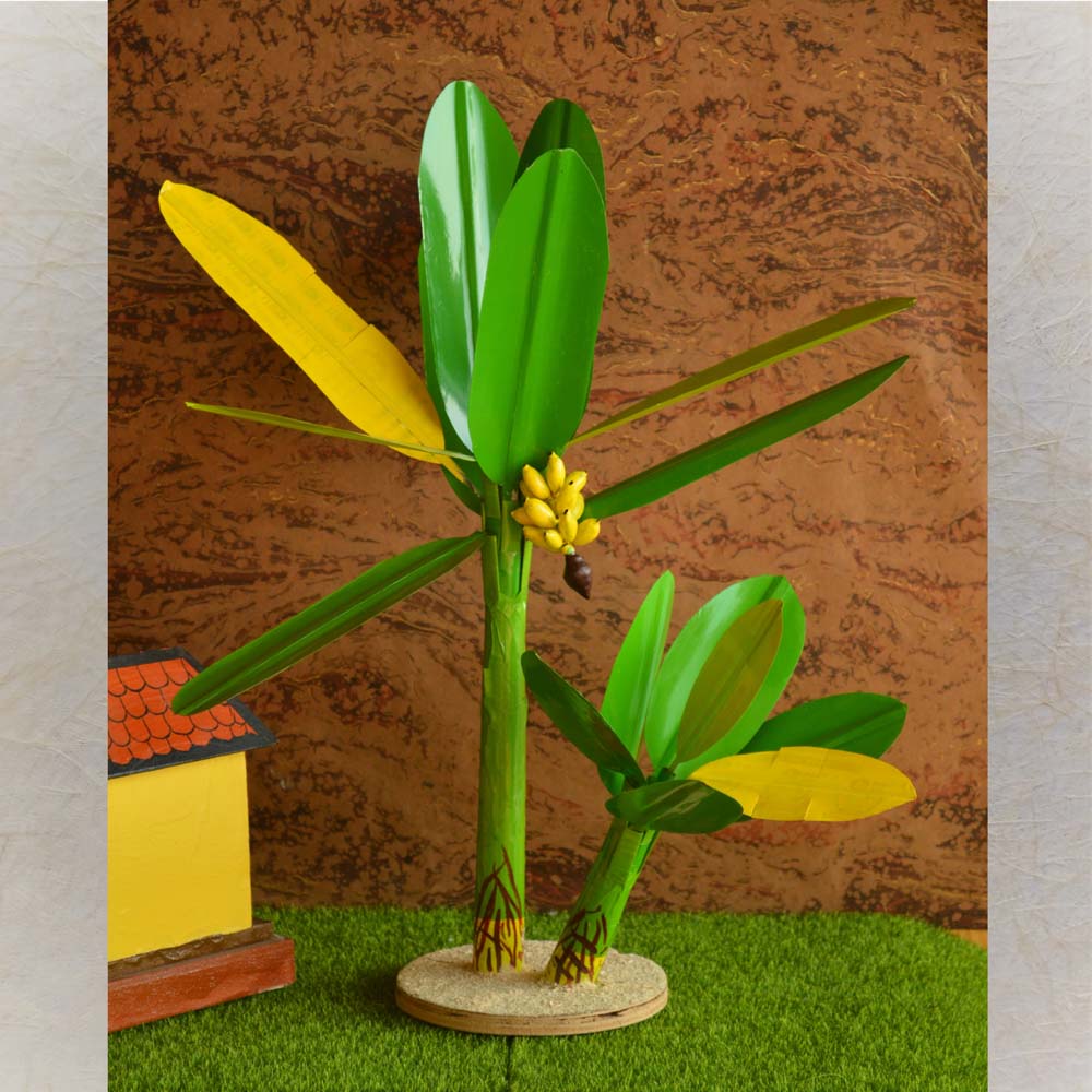 Handcrafted Banana Tree Golu doll with green leaves and yellow bananas, ideal for Navaratri decoration