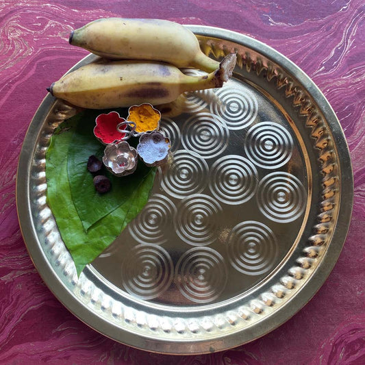 Eternal Plate Laser Circles 10 in brass with engraved spiral design.