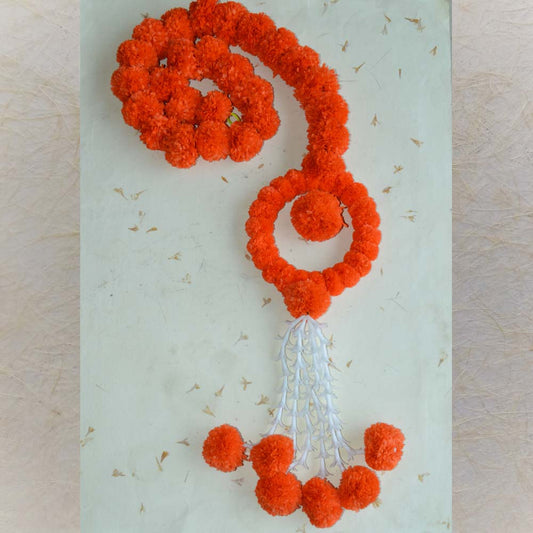 Saffron single-string garland with a circular design, accented with white detailing, perfect for traditional and festive decor.
