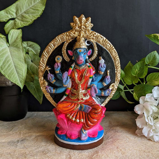 Handcrafted Goddess Varahi Amman Golu doll in red attire with a golden circular arch backdrop, seated on a lotus, ideal for Navaratri festival decor.